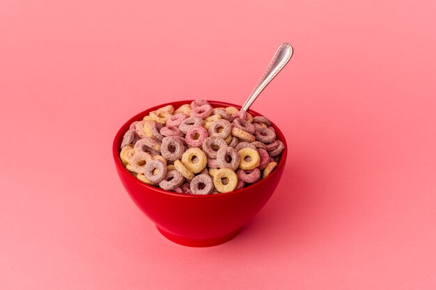 Cereals bowl isolated on pink background