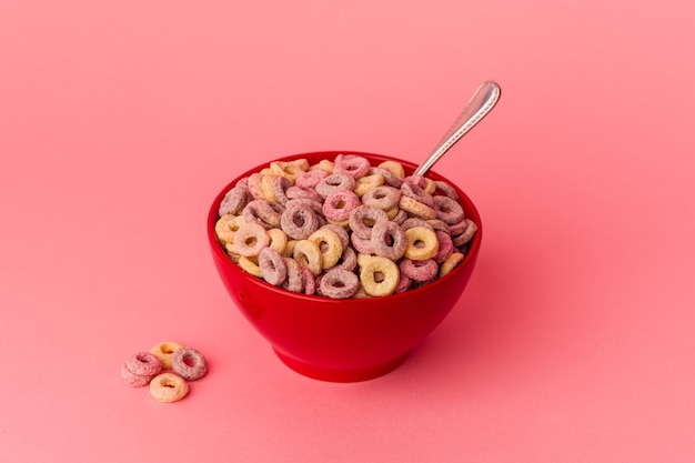 Cereals bowl isolated on pink background