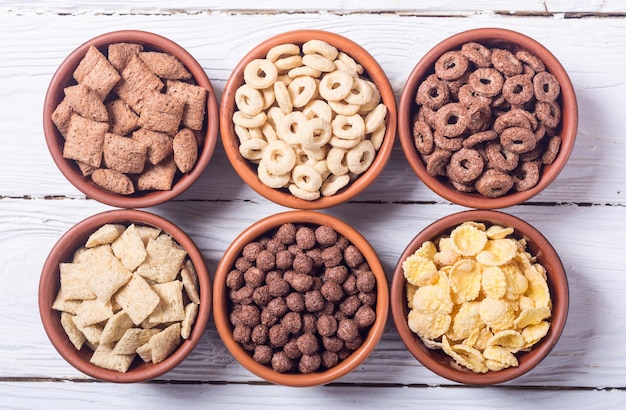 Cereals Breakfast with milk and chocolate cornflakes in bowl