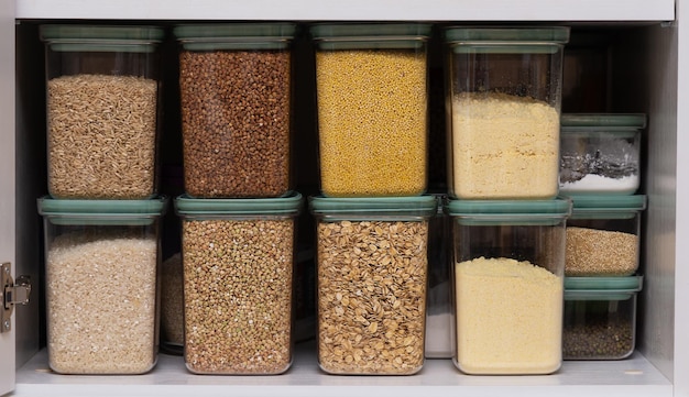 Cereals in containers buckwheat oatmeal millet rice green buckwheat