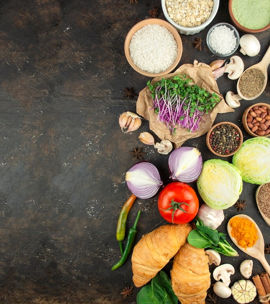 Cereals and vegetables on a dark background Healthy Eating Food background Copy space