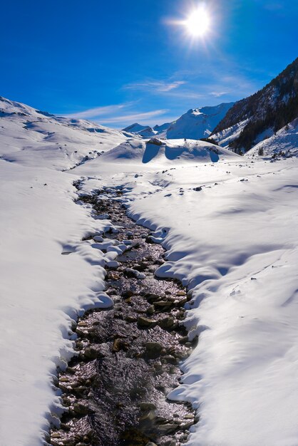 Cerler snow stream in Pyrenees of Huesca Spain