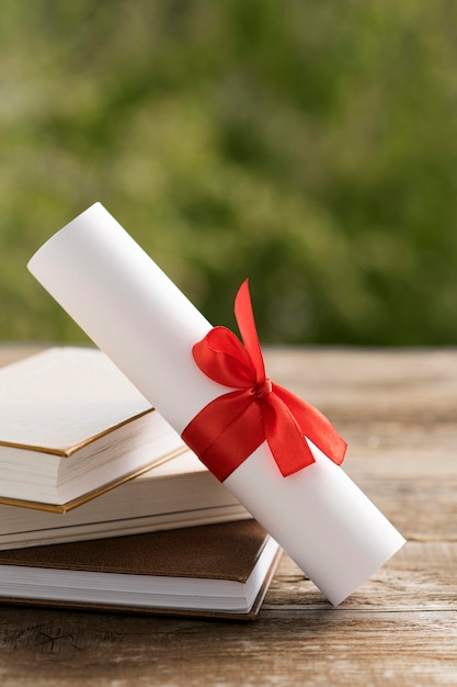 Photo certificate with ribbon and bow blurred background