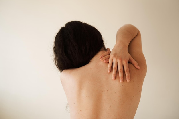 cervical spine osteochondrosis is radicular syndromes of young woman attractive girl feel spine pain because of spinal nerves compression