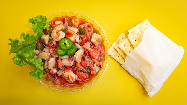 ceviche with yellow background