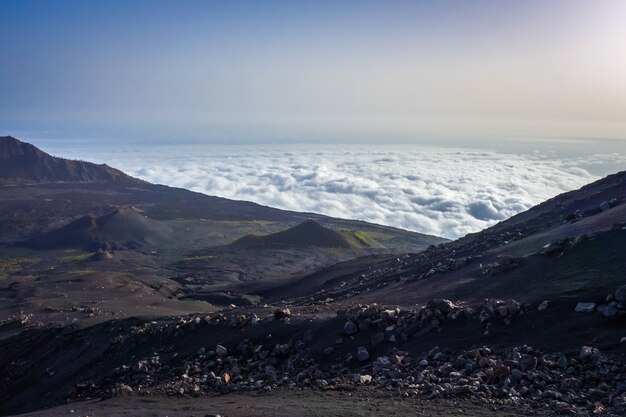 Cha das Caldeiras over the clouds view from Pico do Fogo in Cape Verde