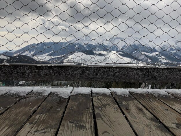 Chainlink fence against sky