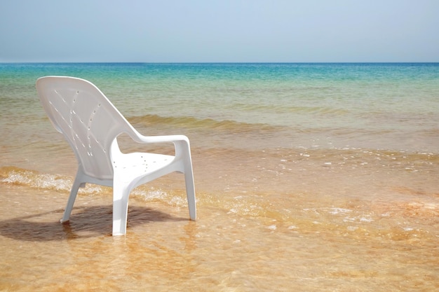 Chair on the beach of Dead Sea