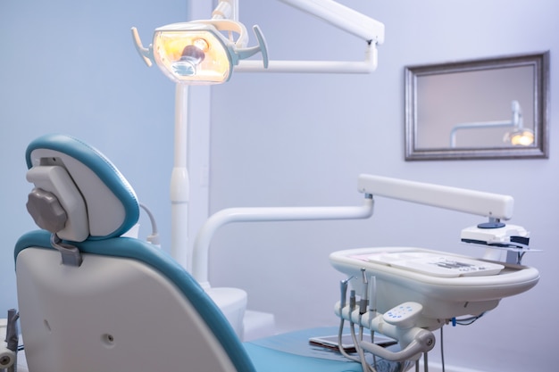 Chair and medical equipments at dental clinic