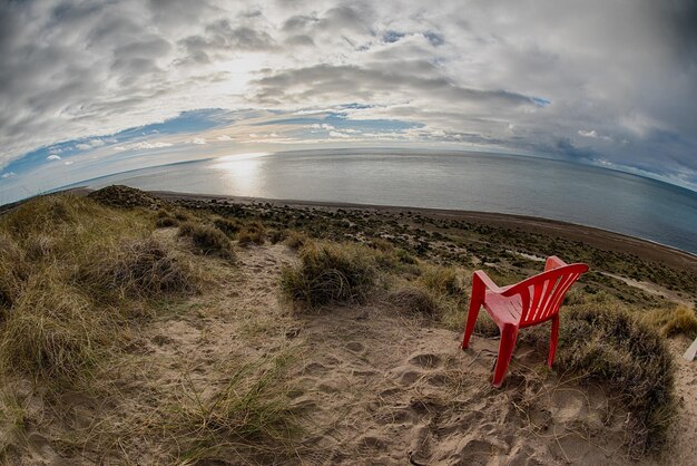 Chair outside patagonia lighthouse in valdes peninsula