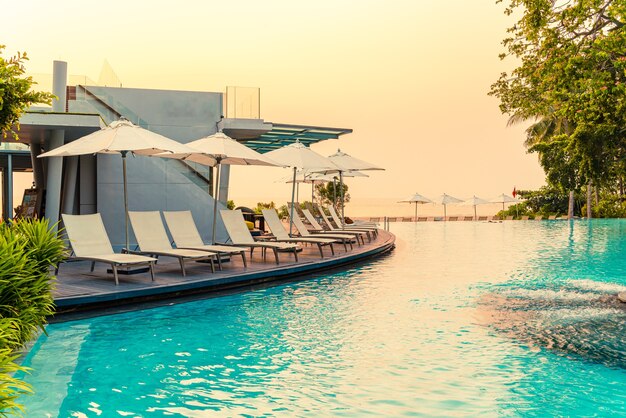 Chair pool around swimming pool in hotel resort