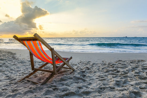 Chair on sand in beach summer vacation