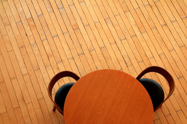 Chair and table on wood floor