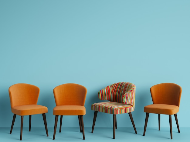 Photo a chair with colorful stripes among simple orange chairs. concept of minimalism. 3d rendering