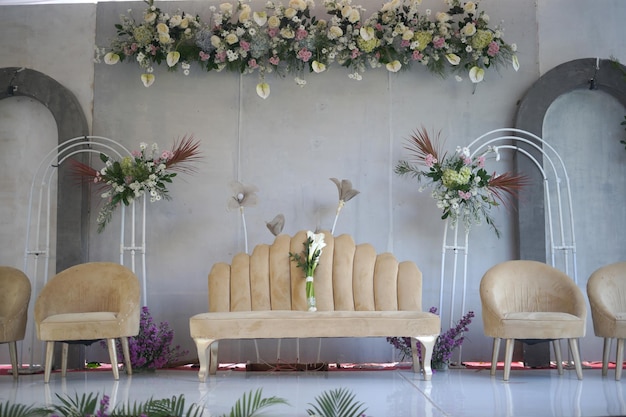 chairs and decoration arrangement for a traditional wedding ceremony in indonesia