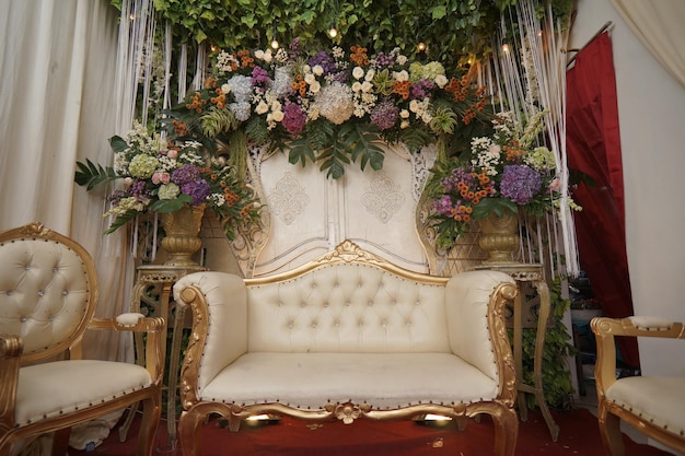 chairs and decoration arrangement for a traditional wedding ceremony in indonesia
