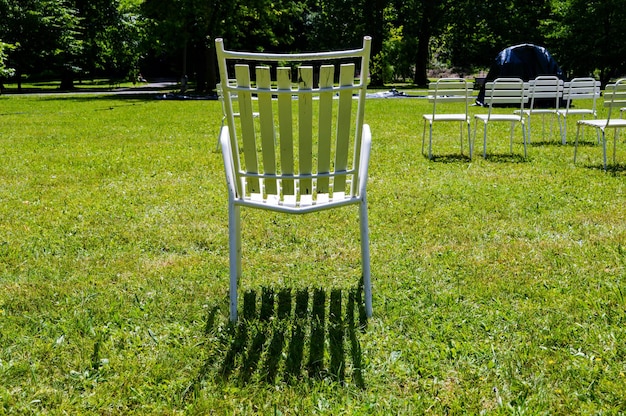 Chairs on grassy field