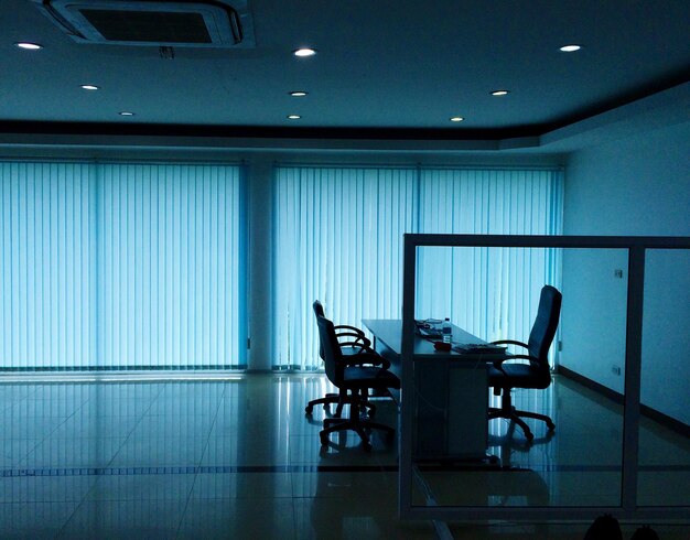 Photo chairs in illuminated room