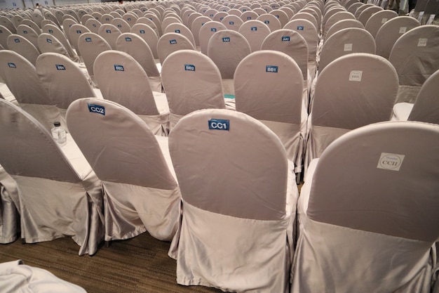 Photo chairs in meeting room hall.