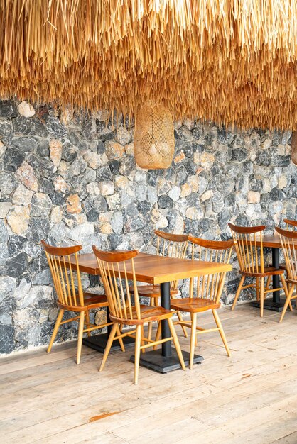 Chairs on table against wall