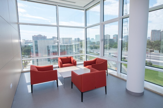 Photo chairs and tables in glass window