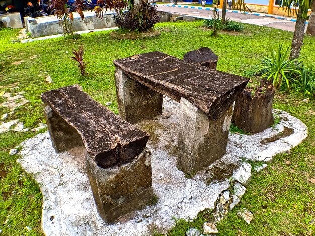 Chairs and tables made of wood pieces in the hospital garden