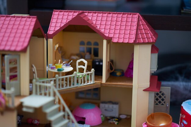 Photo chairs and tables in restaurant outside building toy