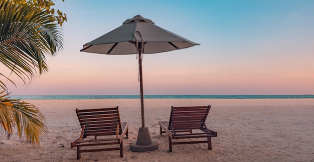 Chaise lounge wallpaper, beach beds chairs with umbrella sunrise sunset sky calm sea sand background