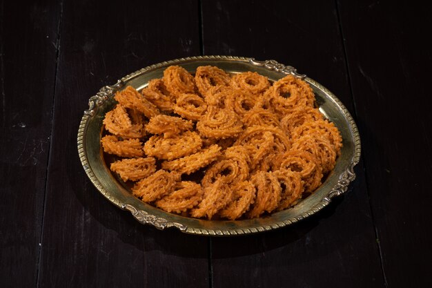 Chakali or Murukku snack is made on Indian Diwali, Holi festival food