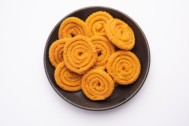 chakli is a savoury snack from india it is a spiral shaped snack with a spiked surface