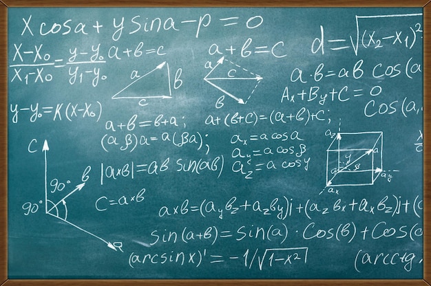 Chalk scribbles on a math board Blackboard formulas shapes geometry concept of education