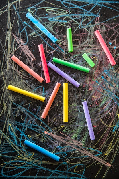 Chalks on black background