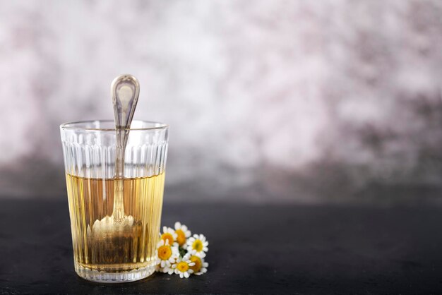 Chamomile flower in front of color background