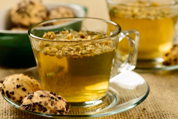 Chamomile tea cup with crackers