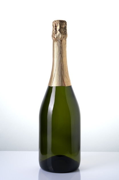 Champagne bottle on table