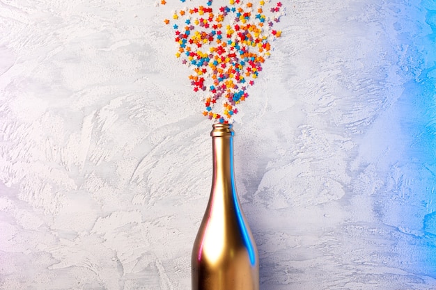 Champagne bottle with confetti