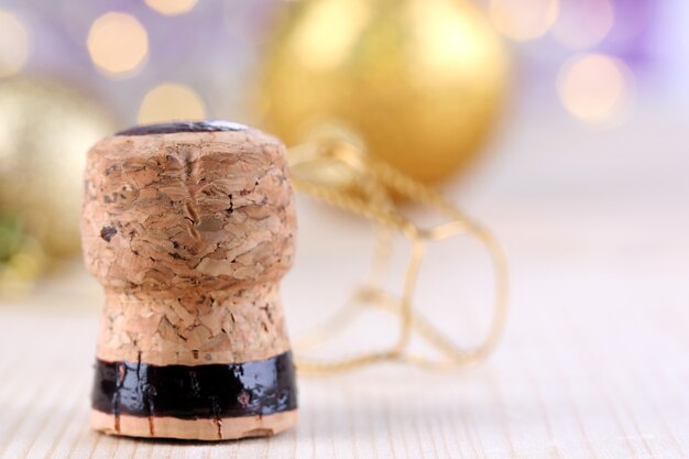 Champagne cork with bokeh lights