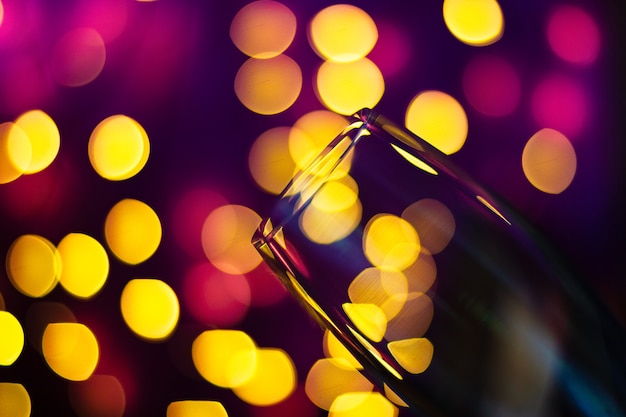 Champagne glass wine close up on bokeh background