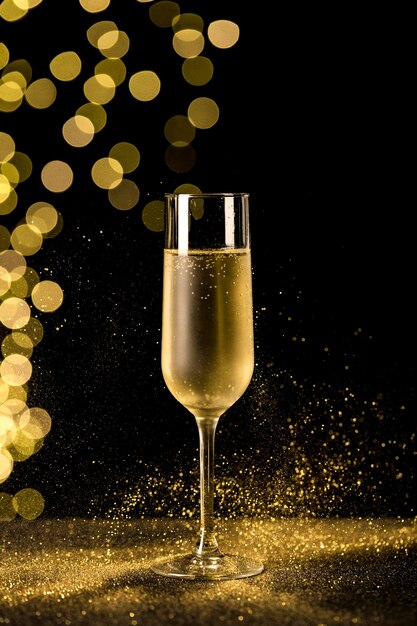 champagne glass with bokeh lights