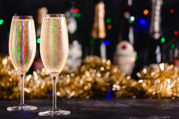 Champagne glasses on a dark background