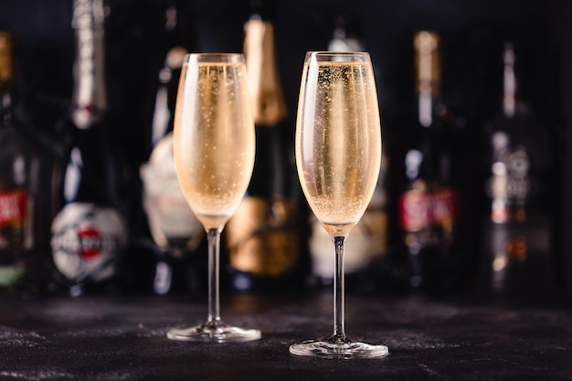 Champagne glasses on a dark background