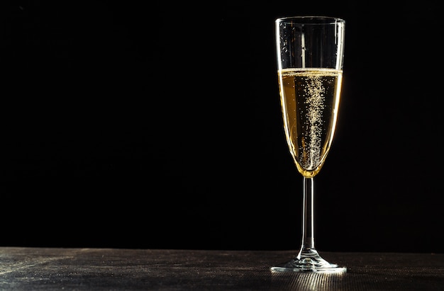 Champagne glasses for festive occasion against a dark background