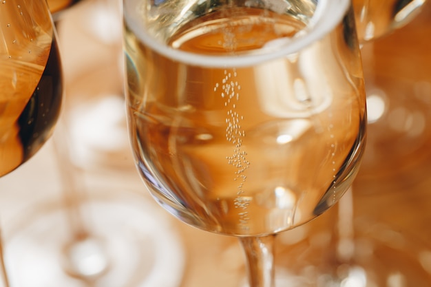 Champagne glasses on table closeup.