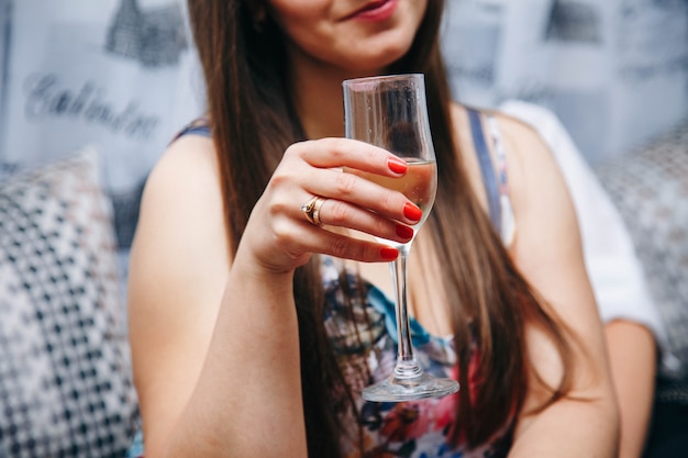 champagne in the hand of a girl. hen party