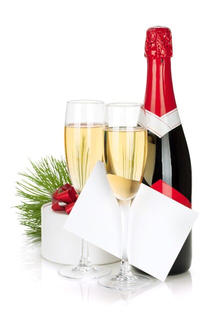 Champagne kerstcadeau en lege wenskaart