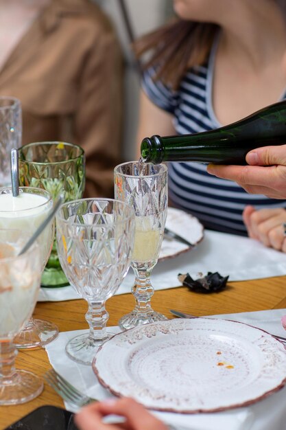 Champagne pour in glasses Party time