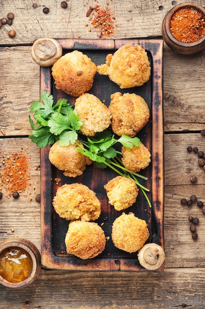 Champignon mushrooms deep-fried