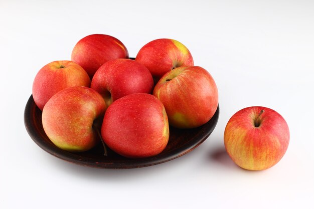 Champion apples on a white surface