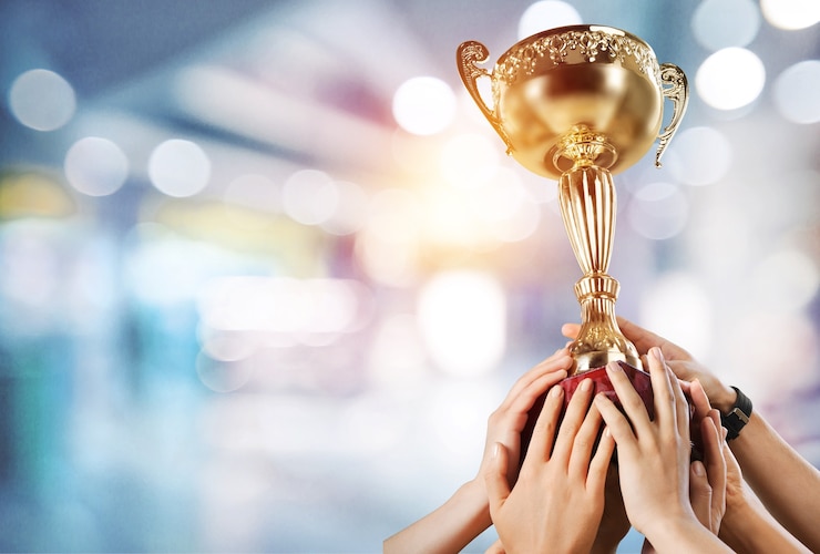 Photo champion golden trophy for winner background. success and achievement concept.