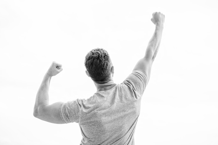 Photo champion winner future opportunity leadership and competition looking forward in future future concept strong muscular body feeling powerful rear view successful athlete victory and success